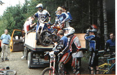 DH Racers load bikes into flatbed truck for another run